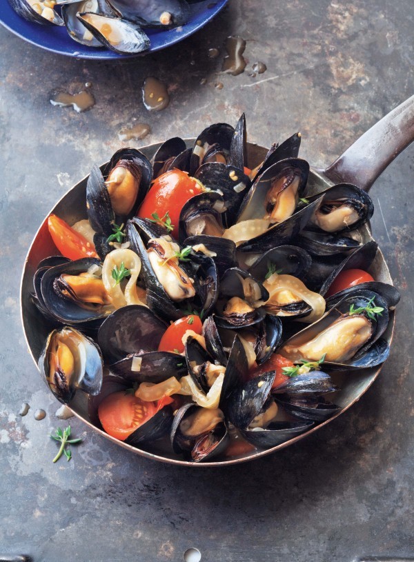 Mussels drenched in ouzo