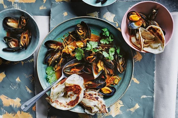 Mussels in chilli curry butter with spring onion pancakes