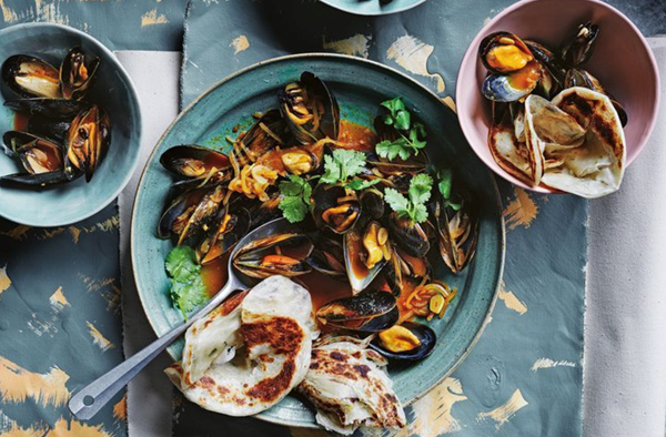 Mussels in chilli curry butter with spring onion pancakes