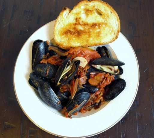 Mussels in chorizo and tomato broth
