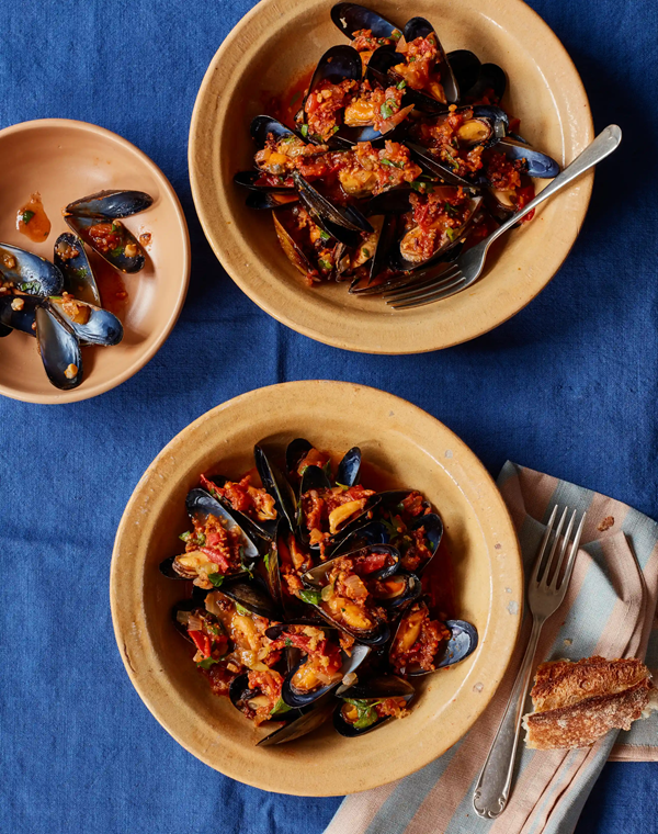 Mussels in tomato sauce with ancho almond picada