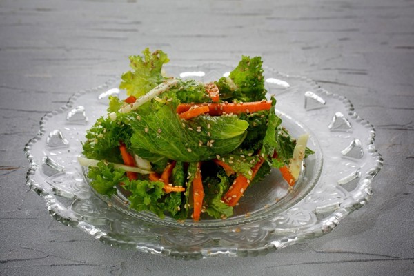 Mustard greens, kohlrabi and carrots with ginger dressing