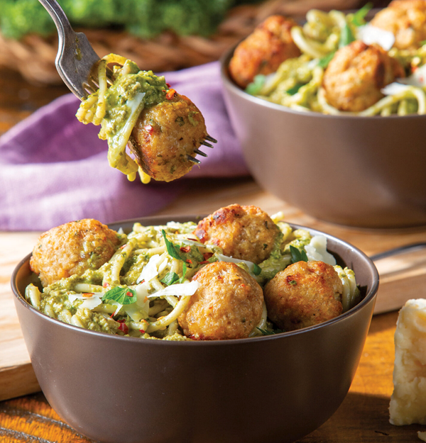 Mustard greens pesto with spaghetti and chicken meatballs