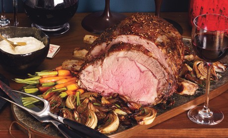 Mustard-seed-crusted prime rib roast with Dijon crème fraîche and roasted balsamic onions