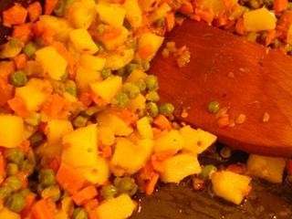 Mustard seed potatoes with carrots and peas