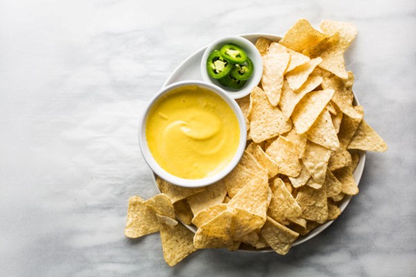 Nacho cheese sauce (with quick pickled jalapeños)