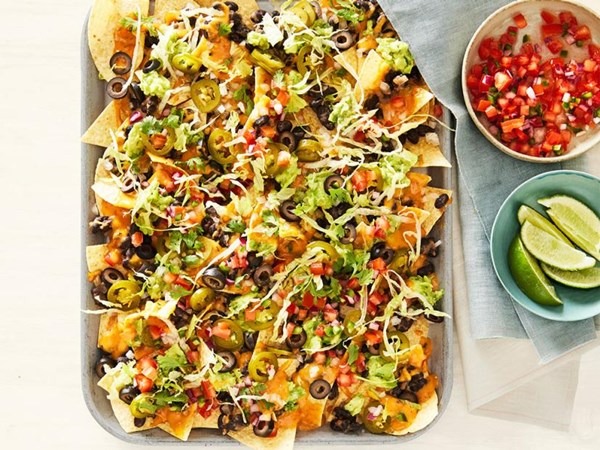 Nachos with vegan queso and black beans 