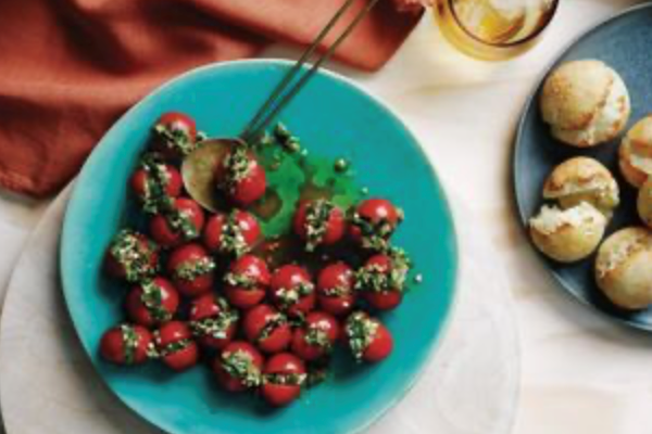 Nada's Egyptian pickled cherry tomatoes with spicy green sauce