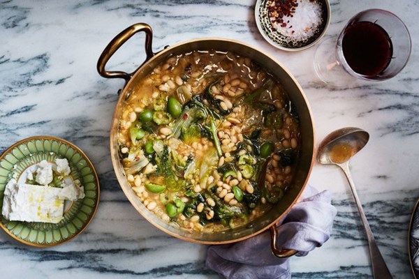 Navy bean and escarole stew with feta and olives
