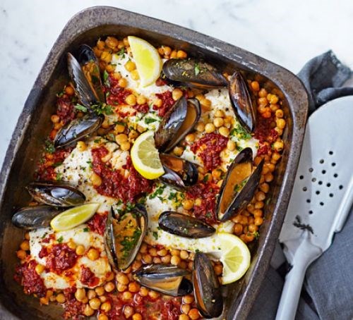 Nduja-baked hake with chickpeas, mussels & gremolata 