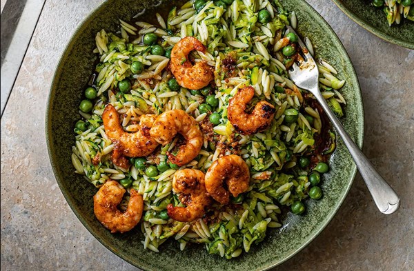'Nduja prawns with courgette & pea pasta