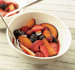 Nectarines and berries in Prosecco