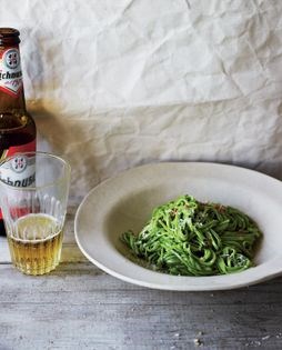 Nettle tagliolini with pecorino, black pepper and cured pork cheek (Tagliolini alle ortiche 'cacio e pepe' e guanciale)