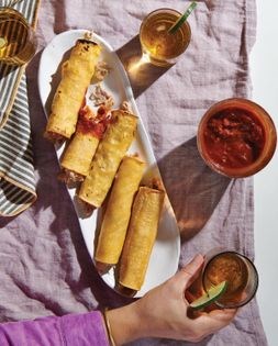 New Mexican chile-dipped chicken taquitos