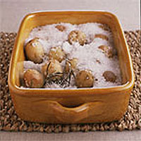 New potatoes in a salt crust