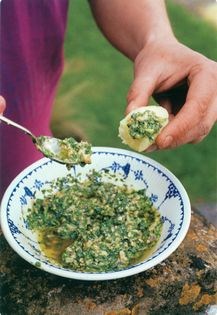 New potatoes in green sauce
