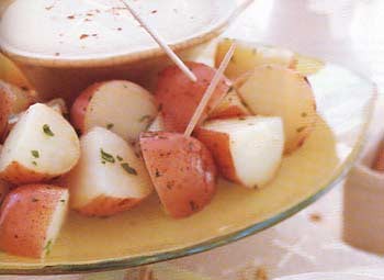 New potatoes with three-cheese fondue