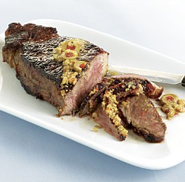 New York steaks with martini butter