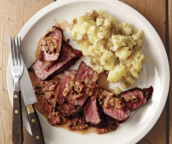 New York strip steak with brandy-peppercorn cream sauce