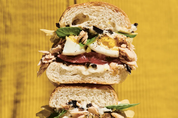 Niçoise sando with smashed eggs & black olive mayo