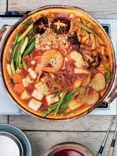 Nikkei hotpot of pork belly, cod & seafood with a spicy gochujang-dashi broth