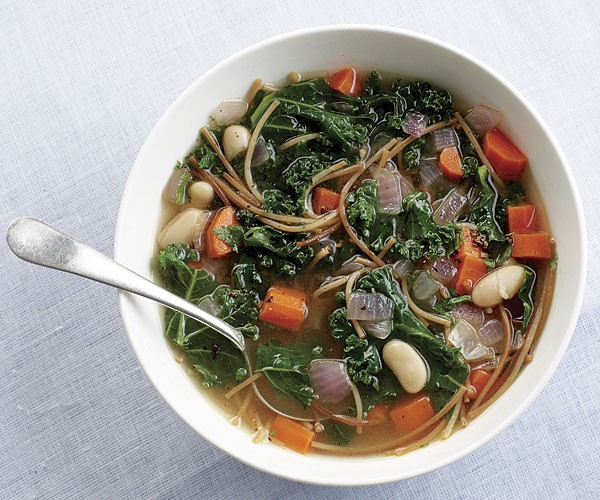 Noodle soup with kale and white beans