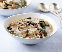 Noodle soup with white beans and collards