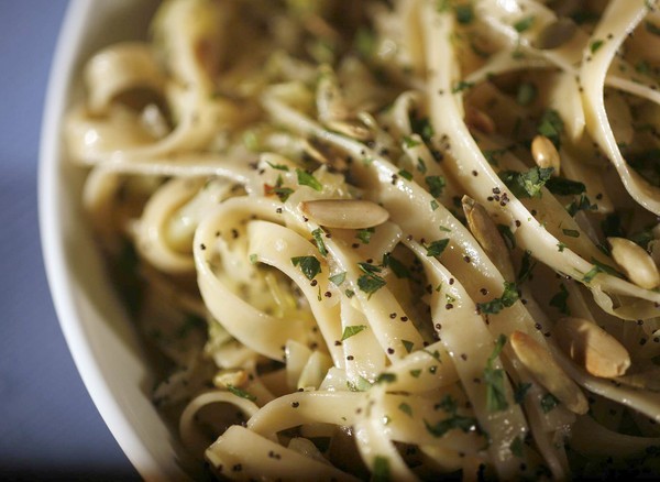 Noodles with cabbage, poppy seeds and pepitas