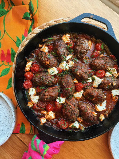 Noor's baked lamb koftas with peppers, feta and oregano