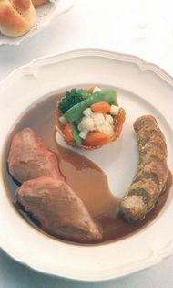 Norfolk squab with its own sausage coated with sesame seeds