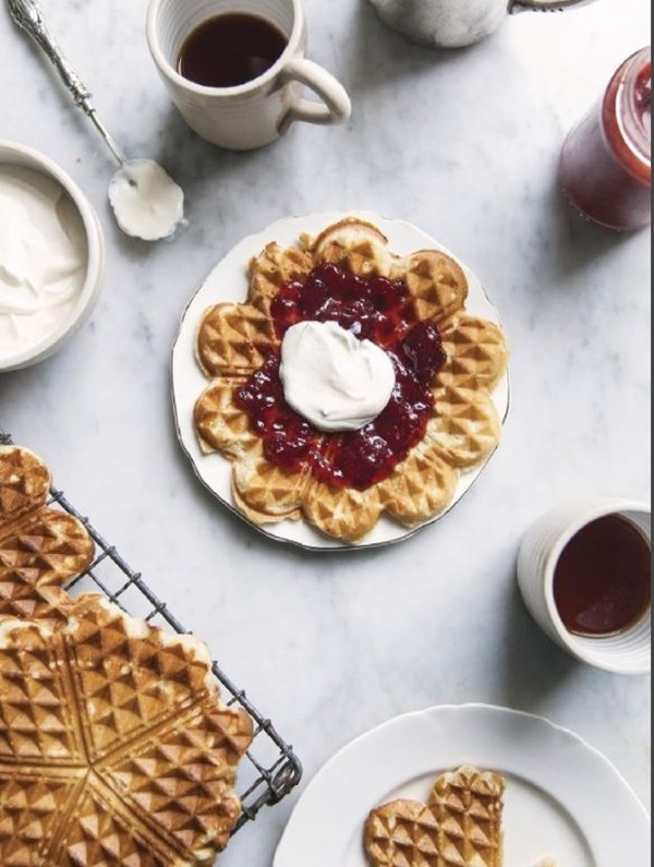 Norwegian waffles with strawberries and sour cream