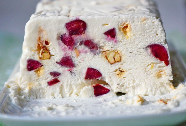 Nougat glacé with sweet cherries and candied almonds