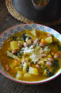 November stew or soup with beans, pumpkin, potato and greens