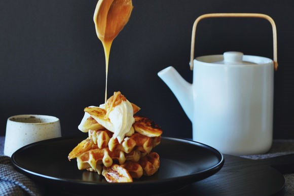 Nut brown butter waffles with salted brandy caramel, banana and crème fraiche
