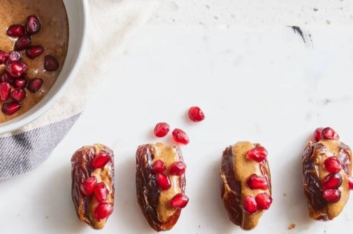 Nut butter-pomegranate stuffed dates