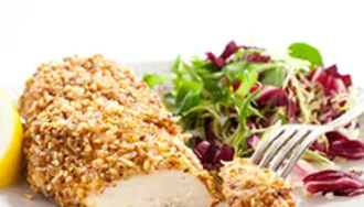 Nut-crusted chicken breasts with orange and oregano