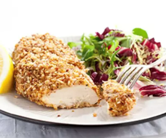 Nut-crusted chicken breasts with lemon and thyme