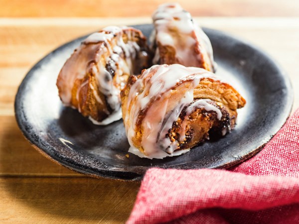 Nutella and brown butter rugelach with peanuts and vanilla glaze