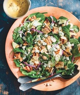 Oakville signature salad with grilled chicken, blue cheese, and Marcona almonds