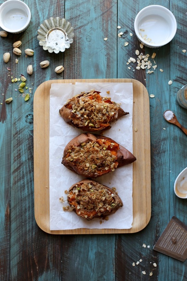 Oat and pistachio crumble topped baked sweet potatoes