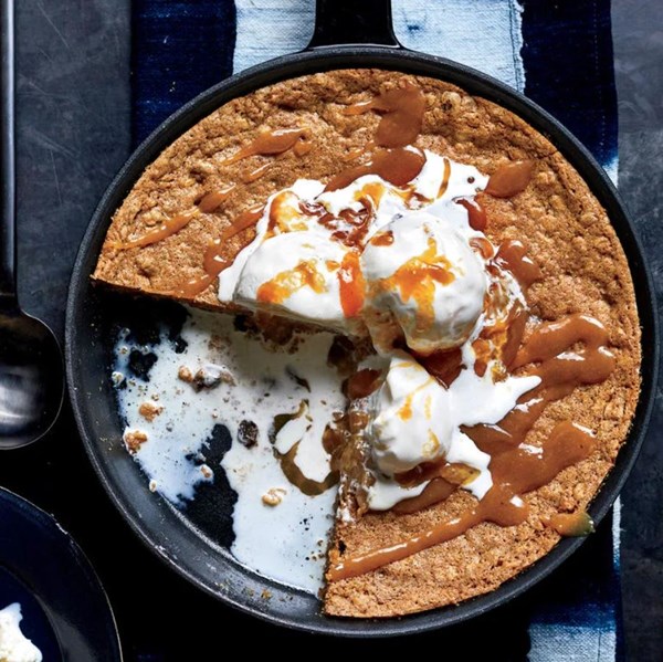 Oatmeal-raisin skillet cookie with miso-caramel sauce