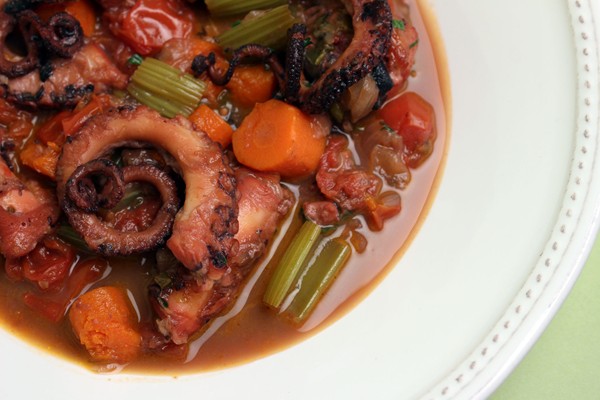 Octopus stew with onions, paprika, and wine