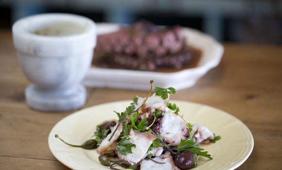 Octopus with olives, caper berry & squid ink pasta