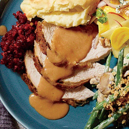 Oil-basted Parmesan turkey with walnut gravy