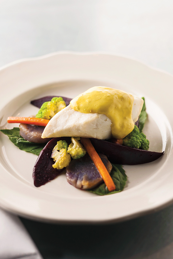 Oil poached halibut with spring vegetables