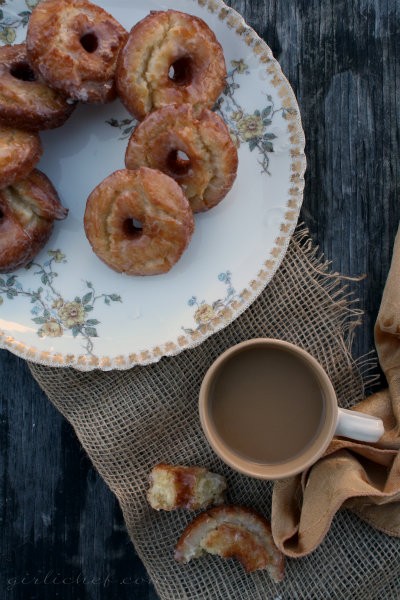 Old-fashioned sour cream doughnuts with vanilla icing