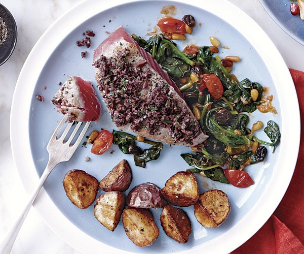 Olive-crusted tuna with spinach ragù