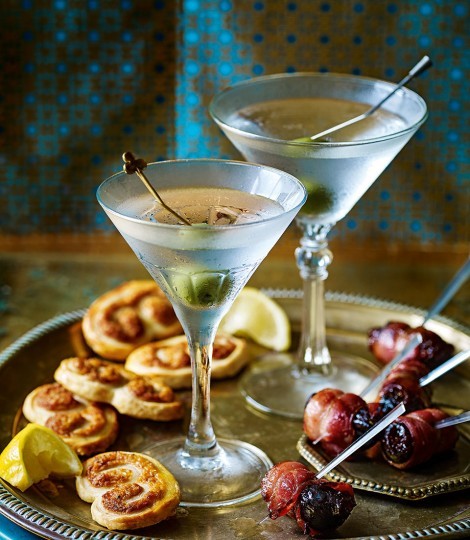 Olive-garnished martini