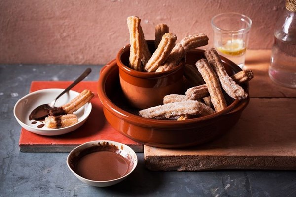 Olive oil churros with salted chocolate sauce