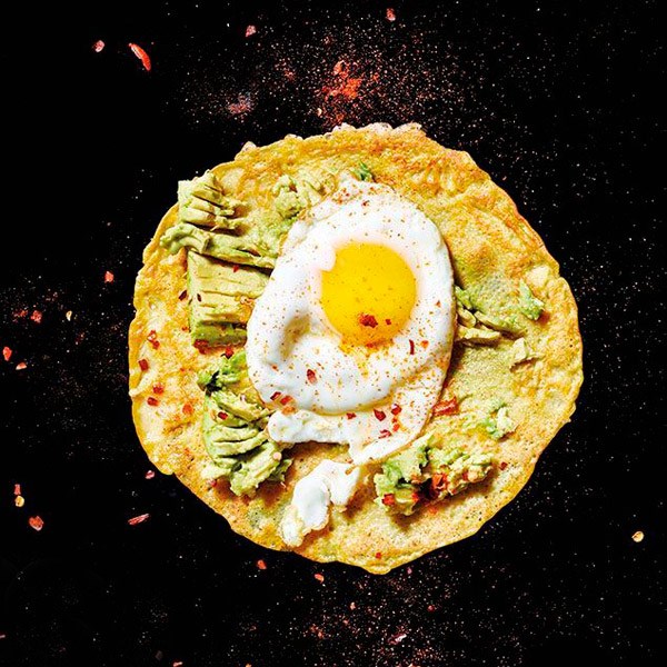 Olive oil-fried egg and smashed avocado crepes